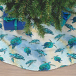 Strand Kerstmis Waterverf Zee Turtle Glitter Kerstboom Rok<br><div class="desc">Voeg een kusttoets toe aan uw vakantie decoreren met deze tropische strandschildpad zee boomrok, met een patroon van schattige turquoise blauwe zeeen schildpadden op een abstracte strandachtergrond met een faux glitter wave en fonkelende steraccenten. Bekijk het collectie voor meer overeenkomende producten of neem contact met me op via Zazzle Chat...</div>