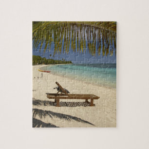 Strand, palmbomen en ligstoel legpuzzel
