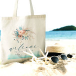 Strandbestemming bruiloft Canvas tas<br><div class="desc">Maak een stijlvol statement met deze Beach Destination Wedding Canvas tas, ideaal voor uw kustfeest. Met een serene waterverf in blauw, blauwgroen, turquoise en perzikkleuren, samen met delicate bloemaccenten, biedt het een chique en boho-sfeer. Met het woord "Welkom" in een elegant script, is deze canvas tas een ideale aandenken voor...</div>