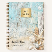 Strandblauwe zandzeester schelpbedrijf logo notitieboek (Voorkant)