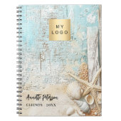 Strandblauwe zandzeester schelpbedrijf logo notitieboek (Voorkant)