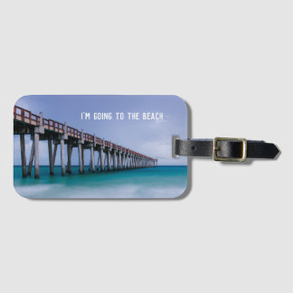 Strandfotocadeau met reisofferte bagagelabel