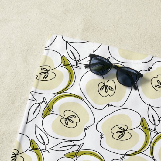 Strandlaken met appel. (In situ)