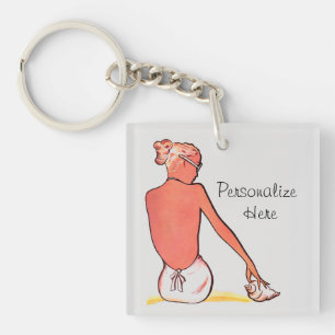 strandmeisje met zeeschelp zomerse elegantie sleutelhanger