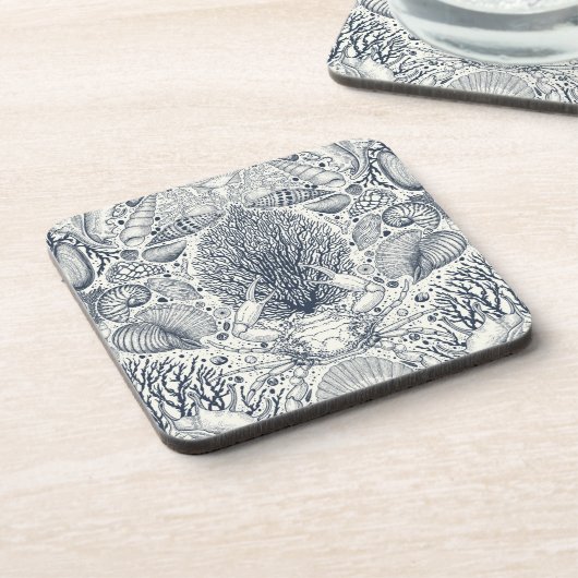 Strandschatten, schelpen, krab, koralen en zeewier bier onderzetter (Linkerzijde)