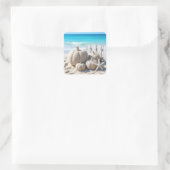 Strandzandpompoenen en zeesterren vierkante sticker (Tas)