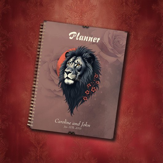 Strength and delicacy united, a black lion  planner