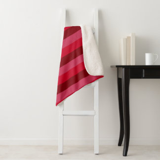 Strepen in tinten rood sherpa deken