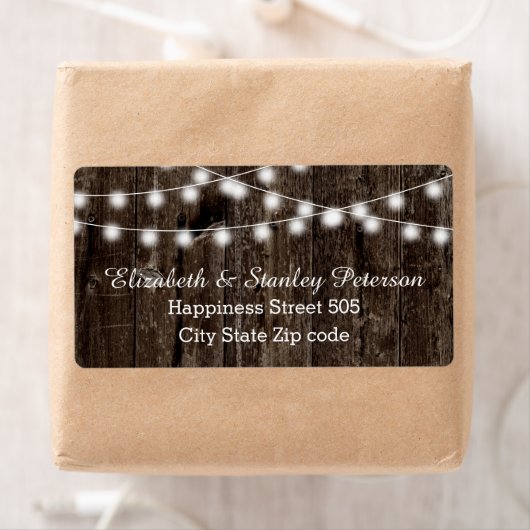 String van lichten op oude houten zomer bruiloft etiket (Insitu)