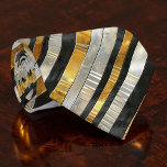 Striped Gold, Black, Silver Necktie Stropdas<br><div class="desc">This stylish necktie features a classic striped pattern in rich gold, sophisticated black, and elegant silver. Perfect for adding a touch of modern flair to any outfit, whether it's for a business meeting, a special event, or simply to elevate your everyday look. The high-quality fabric ensures a comfortable and durable...</div>