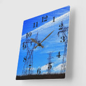 Stroomlijnen in de blauwe lucht vierkante klok (Hoek)