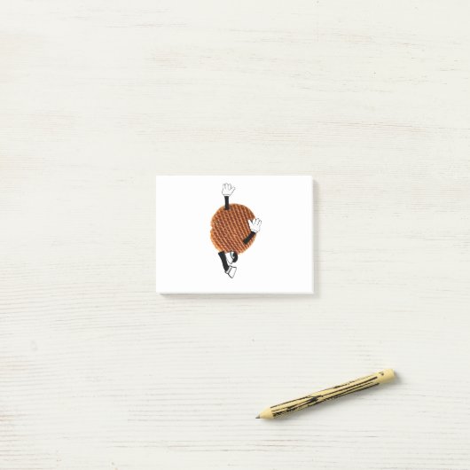 Stroopwafel springen voor vreugde. post-it® notes (Op bureau)