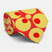 Stropdas met rode en goudpokken (Opgerold)