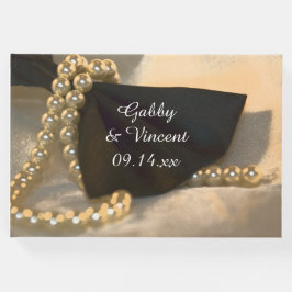 Stropdas met zwarte borst en witte parels gastenboek