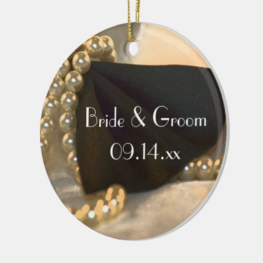 Stropdas met zwarte borst en witte parels keramisch ornament (Links)