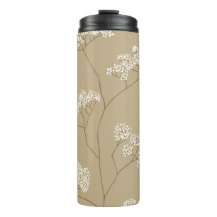 Struiken kleine witte bloemen in beige kleurenpale thermosbeker
