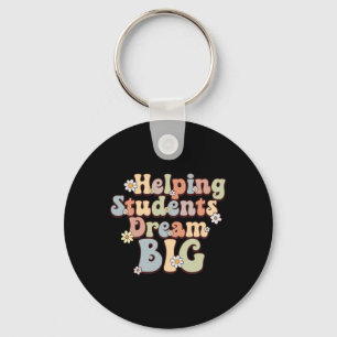 Studenten helpen dromen op grote scholen in week B Sleutelhanger
