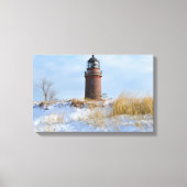 Sturdy Lighthouder op een Rocky Coast in Winter Canvas Afdruk (Voorkant)