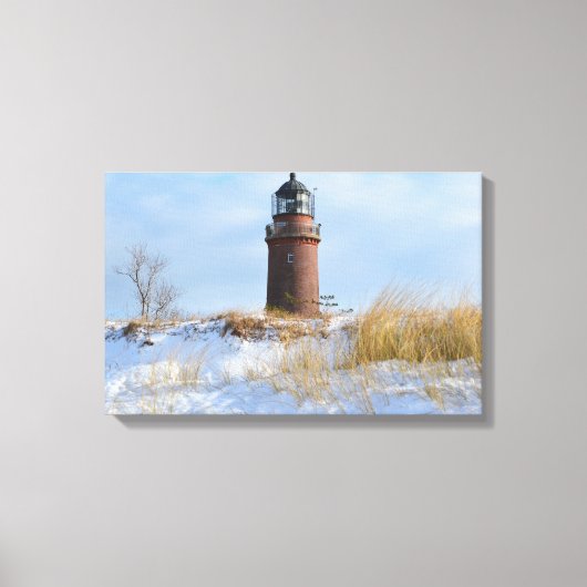 Sturdy Lighthouder op een Rocky Coast in Winter Canvas Afdruk (Voorkant)