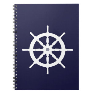 Stuurwiel op de blauwe achtergrond van de marine. notitieboek