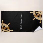 Stuurwielen jacht bootnaam van zwart goud strandlaken (Voorkant)
