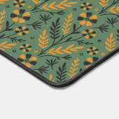 Stylized botanical orange and black floral pattern bureaumat (Hoek)