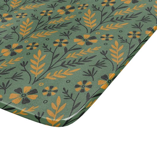 Stylized botanical orange and black floral pattern snijplank (Hoek)
