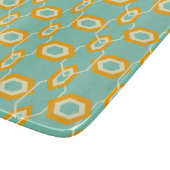 Stylized geometric pattern in bold orange hexagon snijplank (Hoek)