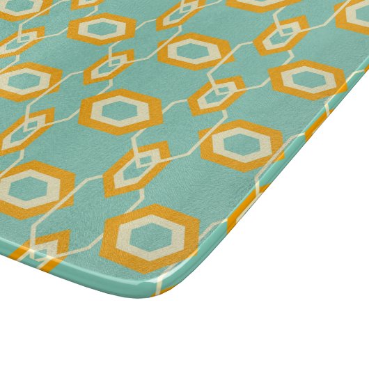 Stylized geometric pattern in bold orange hexagon snijplank (Hoek)