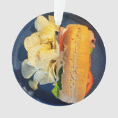 Sub-sandwich en aardappelchips met kerst ornament (voorkant)