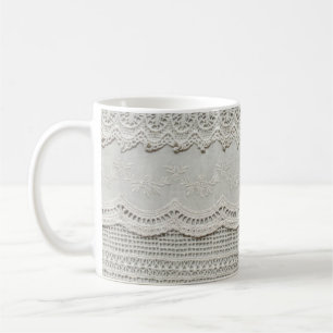 Subtiele witte kant, textiel close-up. koffiemok