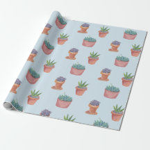 Succulte en cacti op blauw cadeautje tegen achterg