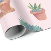 Succulte en cacti op roze cadeauomslag achtergrond cadeaupapier (Rol Hoek)