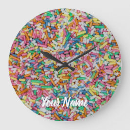 Suiker spint kleurrijke achtergrondcadeau grote klok