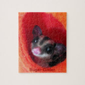 Suikereekhoorn in oranje hangbed legpuzzel (Verticaal)