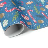 Suikerstokken en ingepakte kersttraktaties cadeaupapier (Rol Hoek)