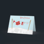 Suite met kerstkaart met kast feestdagen kaart<br><div class="desc">Fun design met kerstpak en onnoemelijk materiaal dat op een sneeuwwinterdag aan een kast hangt. De binnentekst is aanpasbaar.</div>