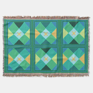 Sun-motief in groene en blauwe patchwork-vierkantj deken