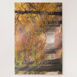 Sunbeams in een herfstbos legpuzzel