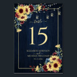 Sunflower Navy Blue Burgundy Wood Floral Weddensch Kaart<br><div class="desc">Creëer De perfecte receptieset met dit warme,  trendy tafelnummer design met zonnebloem,  marineblauw en bordeaux waterverf bloemontwerp,  met een marineblauwe houten achtergrond,  zoete snaarlampen. Ideaal voor herfst en winterbruiloften. Copyright Elegant nodigt uit,  alle rechten voorbehouden.</div>