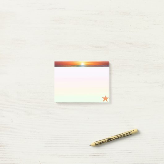 Sunrise en zee ster op pastelkleuren post-it® notes (Op bureau)