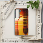 Sunset Harmony akoestische gitaar Samsung Galaxy Hoesje<br><div class="desc">Ervaar de verbluffende mix van de warme kleuren van een adembenemende zonsondergang verweven met de slanke rondingen van een gitaar. Perfect voor muziekliefhebbers die een naadloze mix van artistieke schoonheid en praktisch ontwerp waarderen.</div>