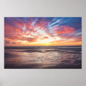 Sunset over beach and sea poster (Voorkant)