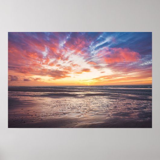 Sunset over beach and sea poster (Voorkant)