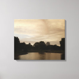 Sunset over een vijver canvas afdruk