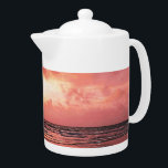 SUNSET THEEPOT<br><div class="desc">Een kleurrijke roze zonsondergang over het zee. Wales.</div>