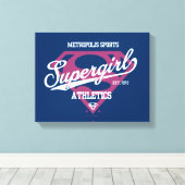 Supergirl Metropolis Sports Athletics Graphic Canvas Afdruk (Insitu (Houten vloer))