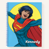 Supergirl Vliegen in Blauw Pak Notitieboek (Voorkant)