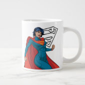 Supergirl zweven in blauw pak grote koffiekop (Rechts)