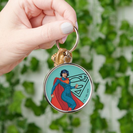 Supergirl zweven in blauw pak sleutelhanger (Hand)